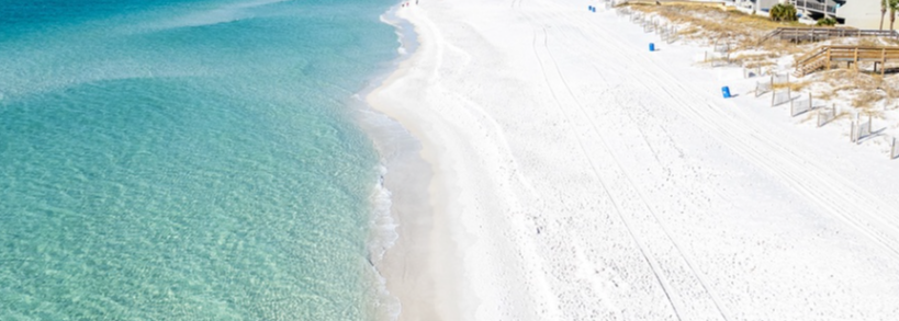 A white-sand beach and turquoise water in Destin, Florida